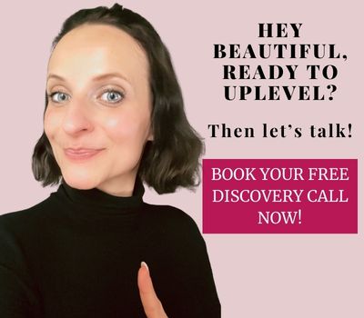 Woman with brown hair and a black pullover is smiling at the camera. The headline reads: "hey beautiful, ready to uplevel? Then let's talk. Book your free discovery call now."