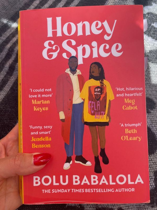Book titled "Honey & Spice"; red cover and showing a young black couple
