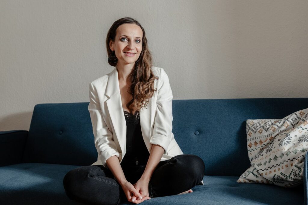 Nadine Kuhn Sitting on a sofa