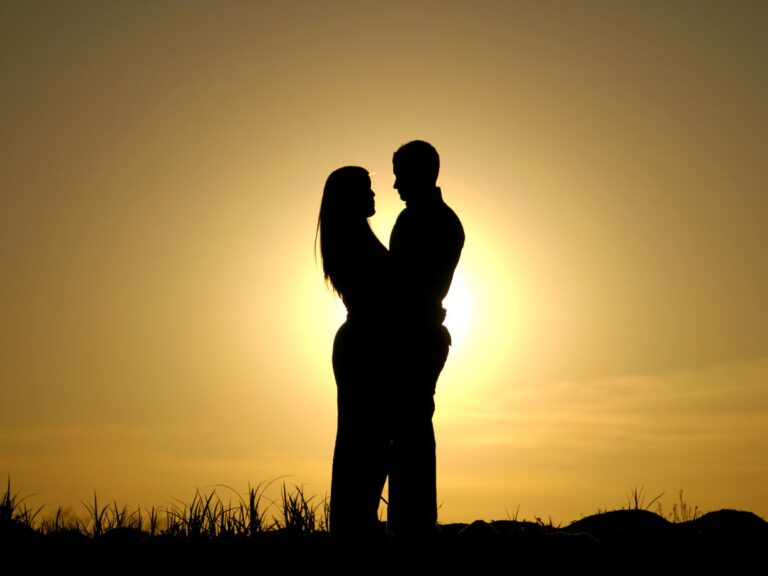 Couple in the sunset: being in love